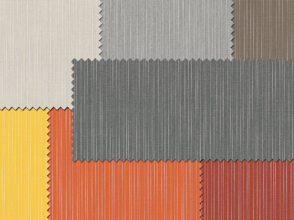 Een patchwork van verschillende stoffen in verschillende kleuren en texturen, waaronder grijs, geel, oranje en bruin. Een patchwork van verschillende stoffen in verschillende kleuren en texturen, waaronder grijs, geel, oranje en bruin.