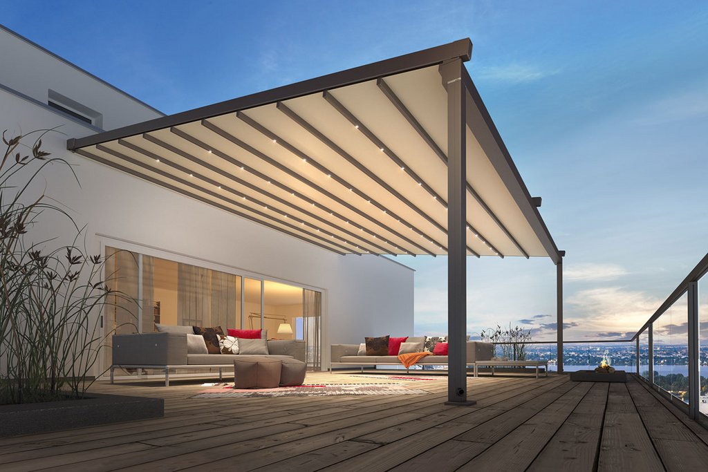 Een moderne overkapping met een strak ontwerp, gelegen op een terras bij schemerlicht.