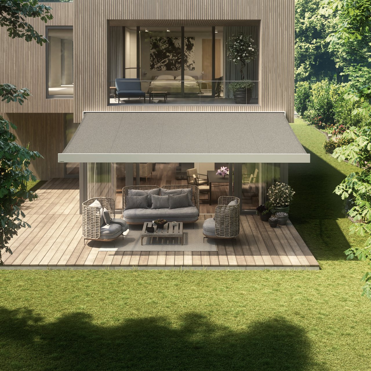 Moderne woning met een grote overkapping en een comfortabele terrassensituatie.