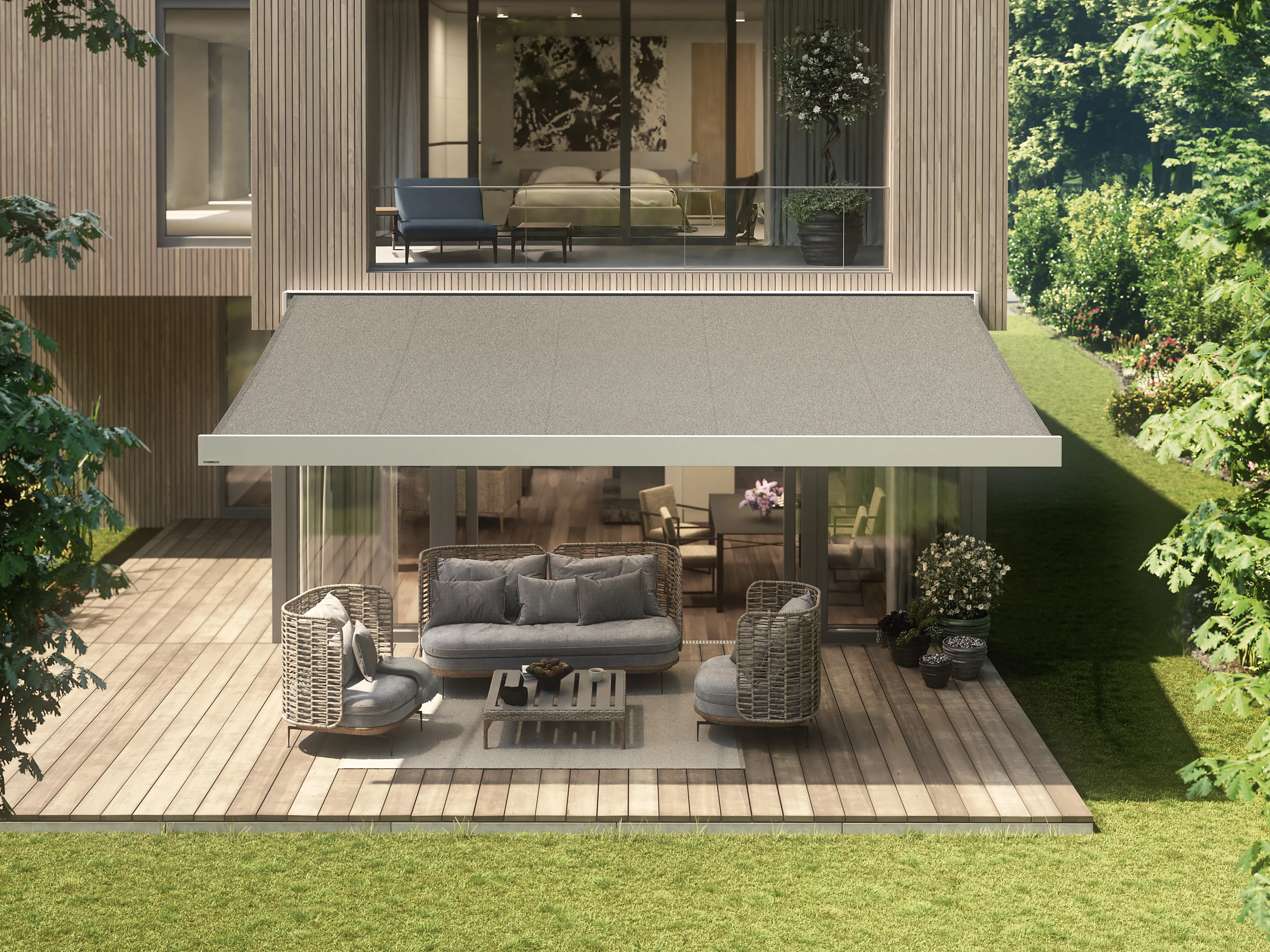 Moderne woning met een grote overkapping en een comfortabele terrassensituatie.